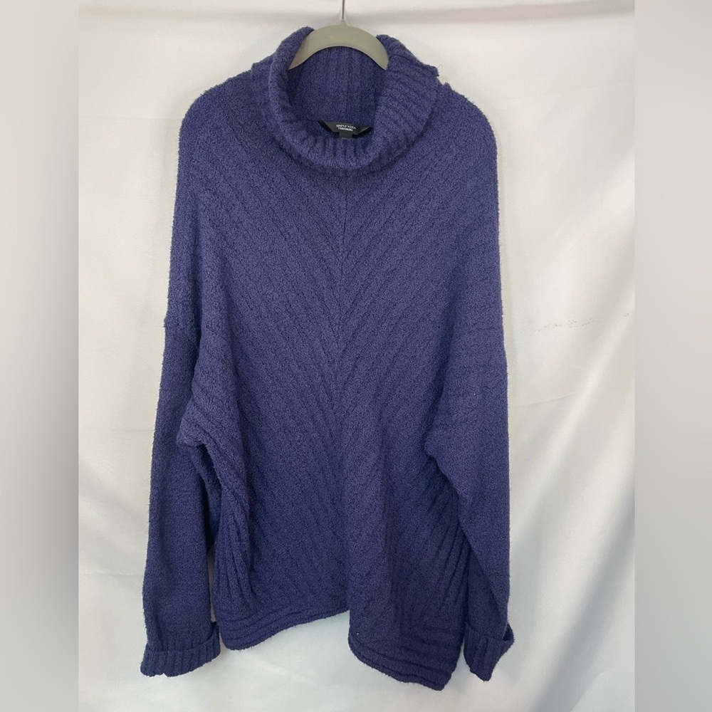Fuzzy cowl necked sweater with a sharkbite hem. Long and oversized.By Vera Wang.